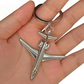Eleganter Schlüsselanhänger mit Miniatur-Flugzeug aus Metall