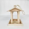 Namensgraviertes Vogelhaus mit Kupferdach als exklusives Gartengeschenk