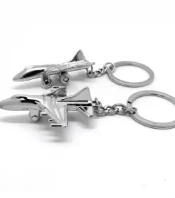 Schlüsselanhänger mit stilisiertem Flugzeug für Vielreisende