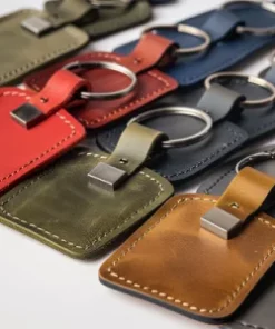 Handgemachter Schlüsselanhänger aus Leder mit Botschaft als Werbegeschenk