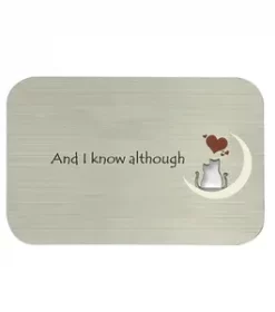 Visitenkarte mit Goldgravur auf schwarzem Metall